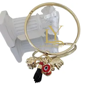 LaYaiBoutique #1135 Protección Bangle Trébol Ojito Hand Aza Elefante Royalty Oro Laminado ALTA Calidad