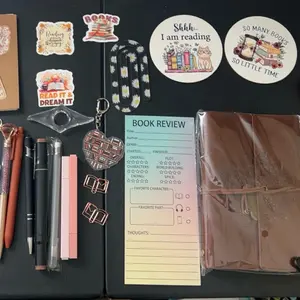 TikTok Packing Video - Bookish Bundle Being Packed with Reading Decorations and Review Tools