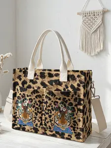 A travel bag with a tiger pattern print, featuring a large-capacity storage bag that is durable and wear-resistant. With multiple pockets, it maximizes space utilization and is suitable for various scenarios such as work, shopping, and picnics