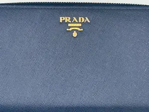 Pre-owned PRADA leather Small Leather Goods Saffiano Zip Around Wallet in Deep Blue – Excellent Condition