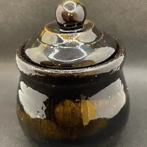 Black amber jar with lid