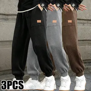 Unisex loose solid-color pants with color-block panels and a drawstring waist; clean straight cut with a relaxed, slimming look. Elastic drawstring waistband fits various body types. Lightweight, breathable fabric that doesn’t feel stuffy against the skin