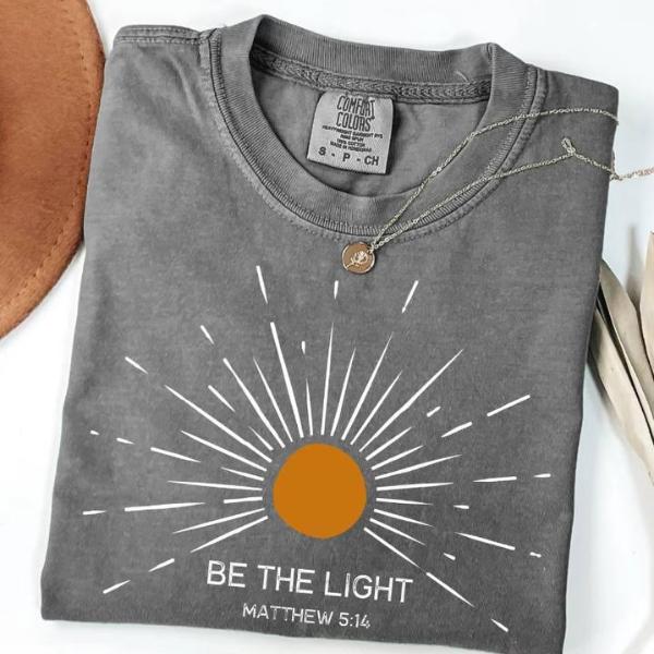 Comfort Colors Be The Light Christian Shirt, Matthew 5:14 Bible Verse Tee, Faith Sunburst Shirt, Religious Tee, Jesus Lover Gift