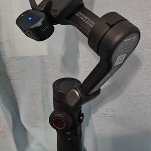 Product Review of Handheld 3 Axis Anti-shake Shooting Stand (1 Count), Rotating Automatic Face Tracking Tripod Stabilizer for Live Video, Phone Accessories, Content Creator Tools from P**🐺