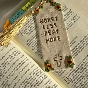 Handmade Faith Inspired Clay Bookmark with "WORRY LESS PRAY MORE" Design, Decorative Elements, and Natural Texture