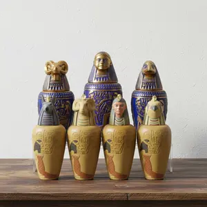 Exquisite Ancient Egyptian Resin Canopy Jar - A collectible statue of gods and pharaohs for home decoration, adorned with gold accents. The delicate head design serves as a removable lid, making it a fine decorative piece.