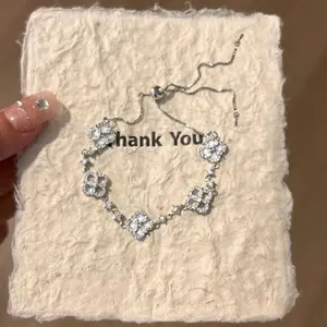 Rich daughter is full of diamonds, four-leaf clover, white fritillary pulling bracelet, women's super flash exquisite light luxury celebrity bracelet