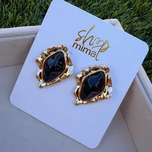 Shop Mima Piedra Oscura Earrings - Gold Plated Black Stone Studs for Women's Fashion Accessories