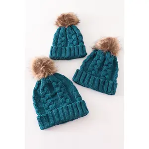 Teal pompom cable beanie