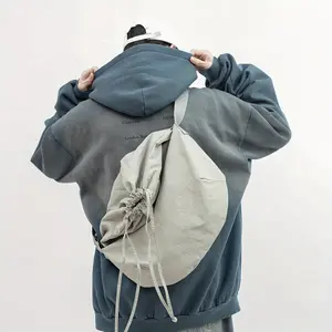 Nylon Crossbody Sling Bag for Men - Durable Soft Shoulder Bag with Adjustable Strap, Drawstring Closure, Versatile Commuter Style