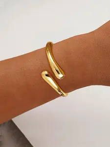 1 fashionable and simple teardrop gold bracelet. The thick teardrop design of the cuff gold bracelet jewelry is a gift for women Heavyweight Bracelet.