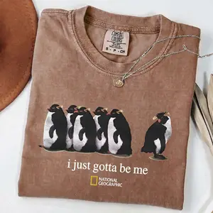 I Just Gotta Be Me National Geographic Penguin Comfort Colors Shirt | Penguin Graphic With Confident Quote Typography And Playful Wildlife Inspired Layout | Trendy Graphic Gift Cotton Cool Quirky Nature Inspired Aesthetic | Unisex Casual Graphic T Shirt