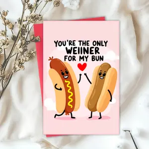 A card with an envelope, featuring a cute cartoon design of a hot dog and bread couple, set against a pink background, with the text "You are my only sausage". It is suitable for Valentine's Day, weddings, birthdays, and Thanksgiving greeting cards