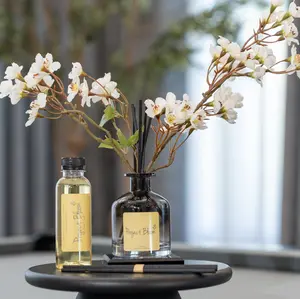 Amber & Vanilla Aroma Reed Diffuser -  Beautifully Packaged Gift Set Includes - White Cherry Blossom Faux Florals Bouquet, Ombre Black Glass Diffuser Vase, Reed Sticks, Acrylic Tray Fragranced Oil -4 oz