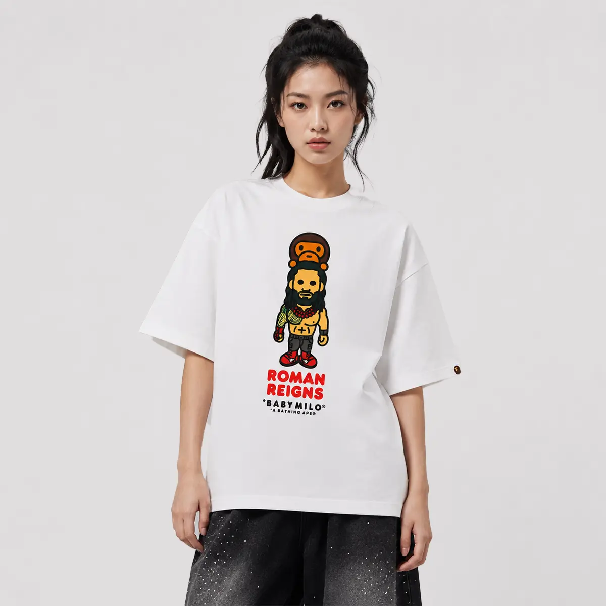 BAPE X WWE ROMAN REIGNS BABY MILO RELAXED FIT TEE WHITE BAPE X WWE ROMAN REIGNS BABY MILO RELAXED FIT TEE WHITE