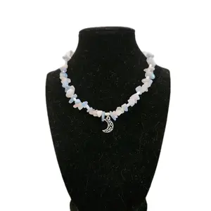 Transgender Pride Flag Themed Natural Crystal Necklace made from Aquamarine, Clear Quartz, and Rose Quartz with a vintage style Moon Pendant