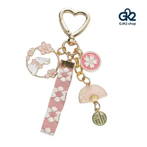 Cute Cherry Blossom Rabbit Keychain, Kawaii Sakura Bunny Bag Charm with Heart Clasp, Aesthetic Floral Keyring for Girls, Sweet Small Gift Black Tassel Long Earrings