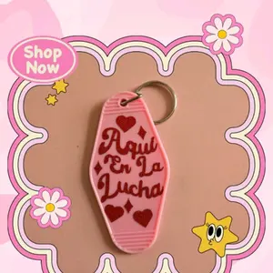 Aqui en la lucha motel keychain
