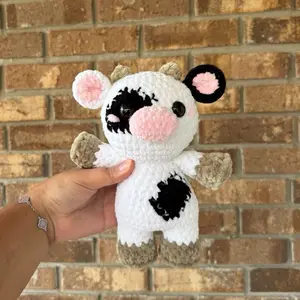 Handmade crochet black and white cow plushie