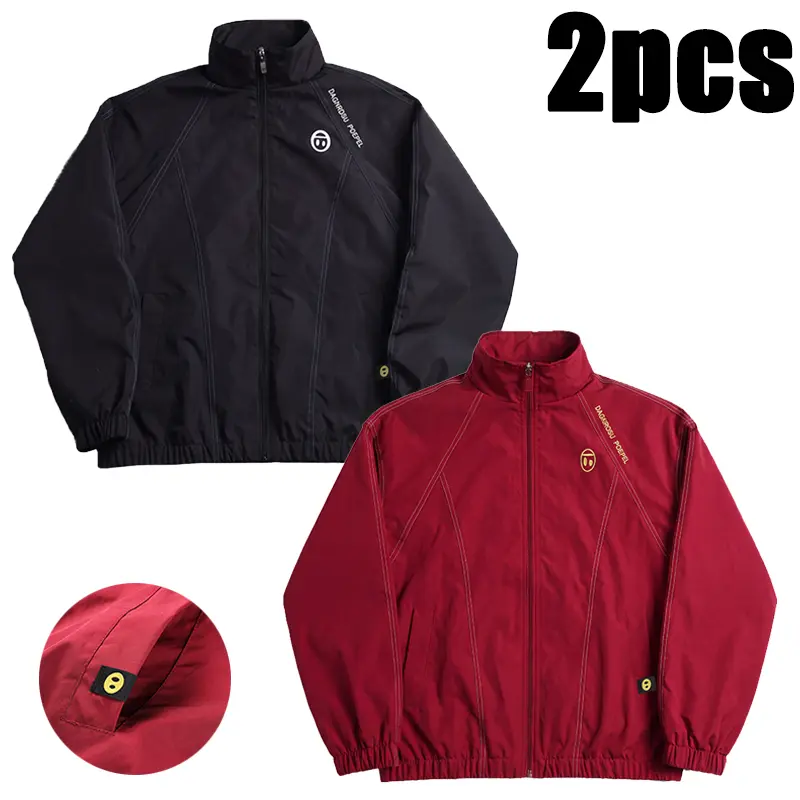 A stand-collar zip-up windbreaker that shapes a modern urban aesthetic, featuring clean diagonal stitching that creates a three-dimensional structure, contrasting color lines for visual accents, and breaking away from the basic design’s monotonous look.