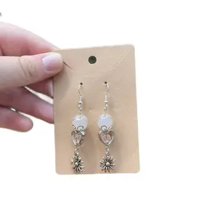 Beaded Floral Earrings Go - Silver Color with Heart and Daisy Charms on Carded Display