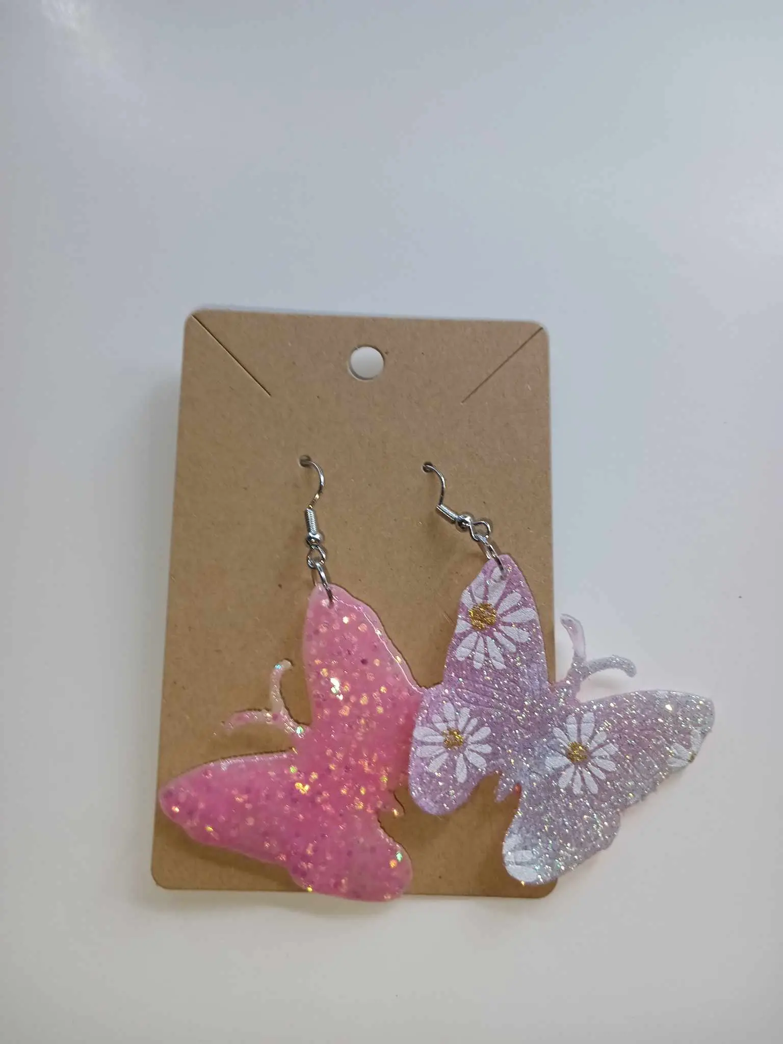 Pink dandelion butterfly resin earrings