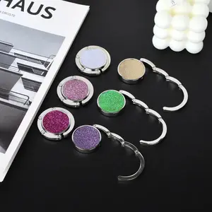 Foldable Handbag Hook, Folding Compact Design, Easy to Store, Fits Makeup Bag, Pocket, or Purse, Portable and Convenient, Model Xinghao 001