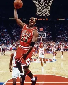 Michael Jordan Jumping with the tongue out Poster