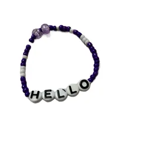 Dark Purple and White "Hello Kitty" Bracelet with Letter Beads and Purple Accent Bead