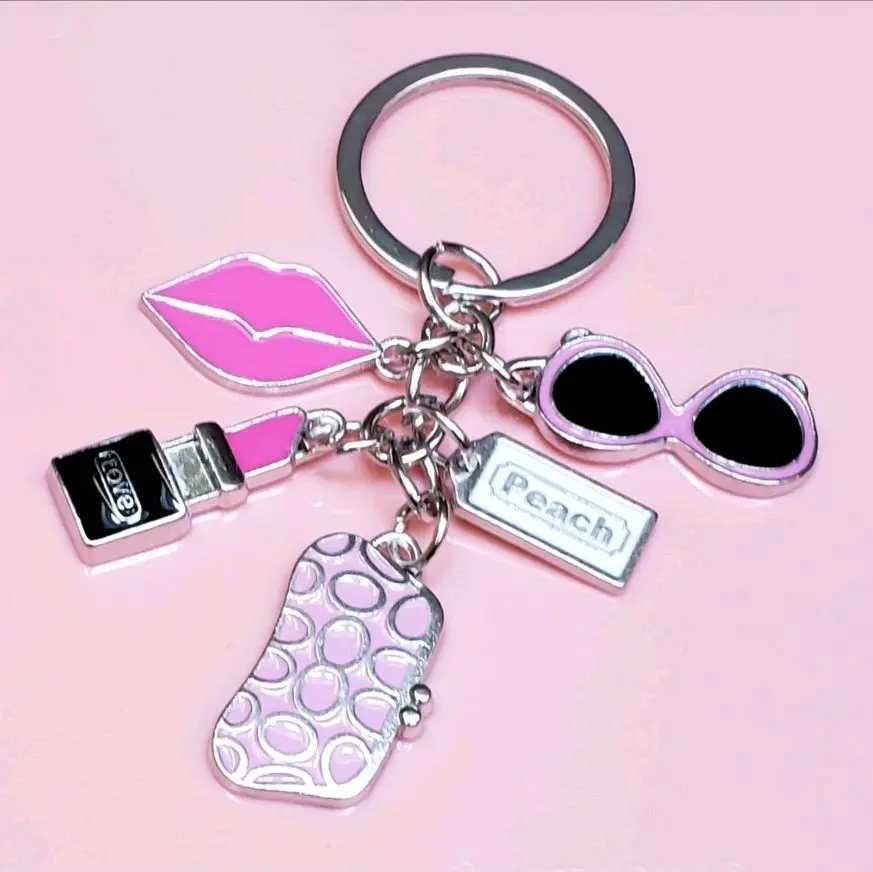 Pink Lipstick Charm Keychain with Sunglasses and Peach Tag for Stylish Accessory
