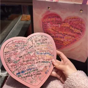1 Heart-Shaped DIY Jigsaw Puzzle: A Valentine's Day Gift for the Lady of the Heart, Featuring “I Love You” and “Happy Birthday” in 100 Languages.Includes a heart-shaped frame with assembly instructions. Suitable for ages 12 and up.Comes with a giftbag