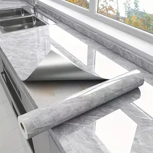 A self-adhesive-waterproof, heat and oil resistant wall and tabletop stickers, Marble Backsplash Wallpaper - randomly paired with shapes and stripes for furniture, bathrooms, kitchen renovations and home decor