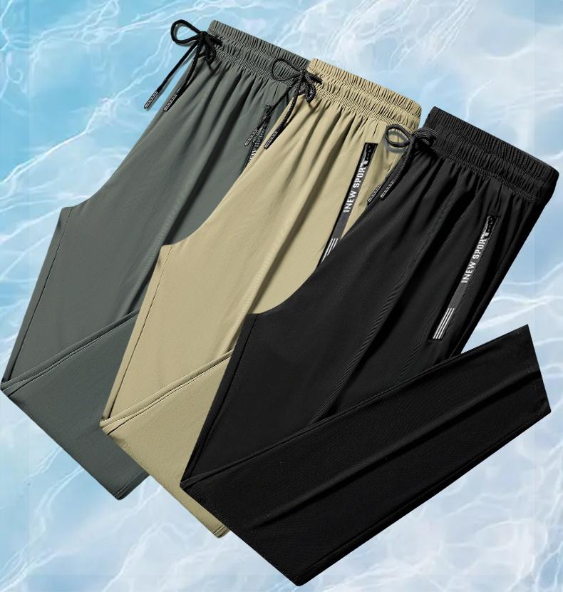 Men’s quick-dry athletic pants, elastic waistband drawstring cuffs, zippered pockets, breathable summer fitness long pants, solid color versatile for everyday casual wear