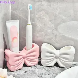 Cute Bowknot Ceramic Toothbrush Holder, Decorative Bathroom Organizer, Multi-Purpose Storage Rack for Electric Toothbrushes, Perfect for Home, Dorm & Hotel Use