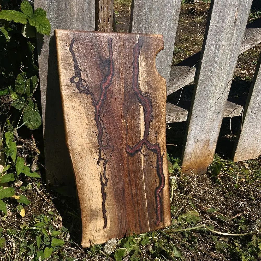 Custom Wood and Resin Charcuterie Board with Unique Natural Wood Grain and Resin Inlay for Stylish Serving