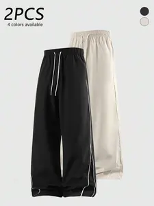 2-pack men’s casual long pants with side stripes, adjustable drawstring waist, skin-friendly comfortable fabric, trendy versatile loose straight-leg pants