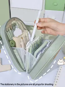 Stylish simple matcha green stereo student stationery storage bag, multi-compartment portable pencil box, classic personality versatile high-value desktop storage bag, exquisite cosmetic bag in hand, Pencil Holder
