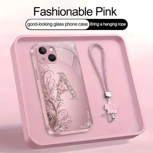Suitable for [iPhone 15 Plus] high-end women's phone case🤩，a beautiful four-leaf clover lanyard is included🍀，Exquisite floral print, non-3D rhinestones, 26 letters to choose from YM99