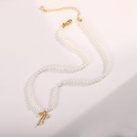 Pearl Chain Bow Pendant