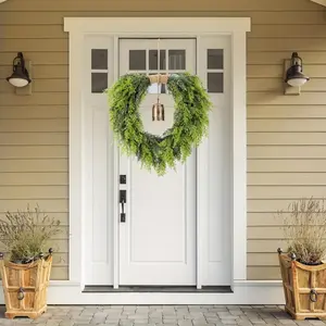 Realistic and lifelike cedar wreath with bells - Front door fake Christmas wreath, realistic green heart-shaped cedar wreath, suitable for home, windows, tables, fireplaces, walls, indoor and outdoor holiday decorations, to hang in front of the fireplace