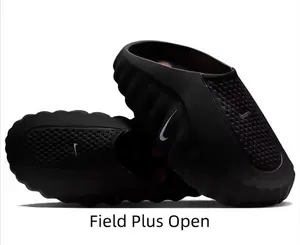 Modern black slides with eye-catching orange sole details