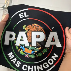 El Papá Más Chingon Shirt with Unique Design and Text Featuring a Central Emblem