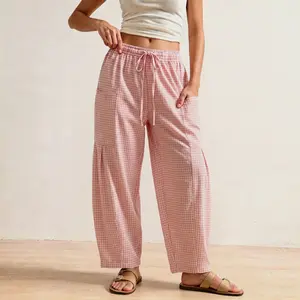 55% cotton, 45% polyester; women’s comfortable gingham plaid wide-leg pants with drawstring waist and pockets, suitable for everyday wear, outings, travel, vacations, seaside, and beach.