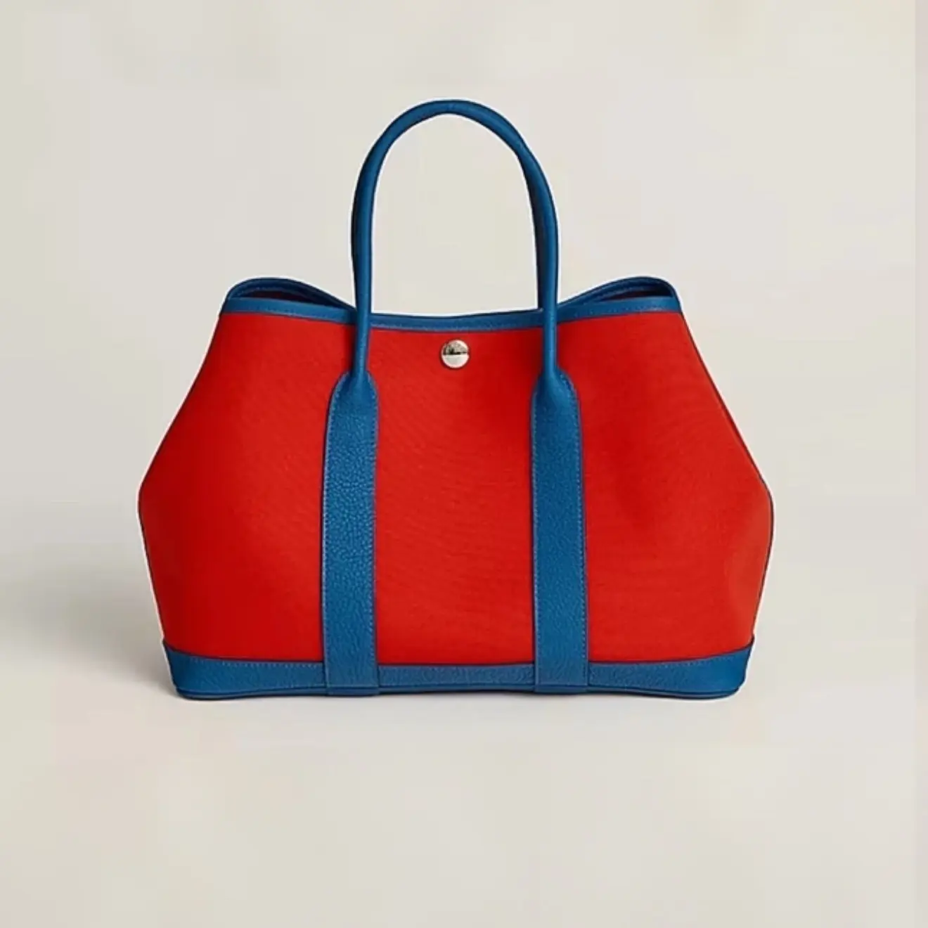 Pre-owned HERMÈS Garden Party 30 bag in French blue canvas with orange accents(2603162)