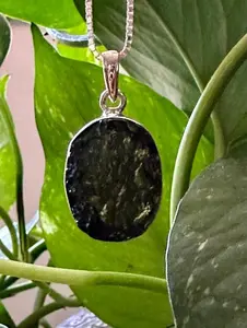 Authentic Moldavite Pendant with Necklace: A 4.5 grams genuine celestial gem, verified for authenticity. Embrace cosmic energies, deepen your spiritual connection, and leap to a transformation journey. Elevate your style and consciousness now.