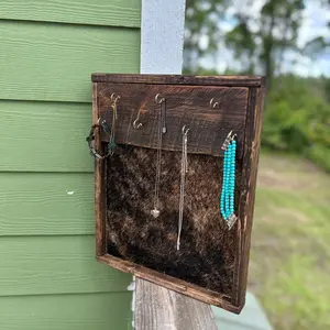 Cowhide Jewlery Holder // Western Jewlery holder // home decor // custom cowhide necklace holder // cowhide and wood hanging Jewlery rack // western Jewlery organiser