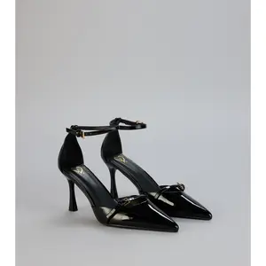 Point Taken Closed Toe Buckle Pumps
