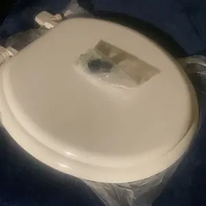 Enameled Wood Round Closed Front Toilet Seat in White with Enameled Finish