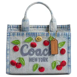 COACH Cargo 20 Crossbody Handbag for Women – Cherry Embroidery, Metallic Hardware, Fabric, Small Size, Mixed Denim Color