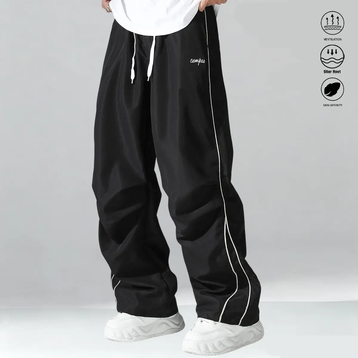 Men’s casual long pants with a drawstring elastic waistband design; stylish casual athletic trousers suitable for everyday wear and outdoor sports; men’s long pants, menswear.